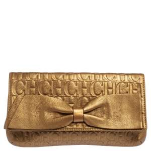 Pre Owned Carolina Herrera Gold Monogram Embossed Leather Bow Flap Clutch