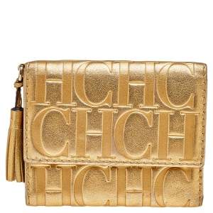 محفظة كارولينا هيريرا جلد منقوش ذهبي ميتاليك ثلاثية الطي