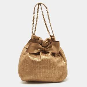 Carolina Herrera Gold Monogram Embossed Leather Bow Bucket Hobo