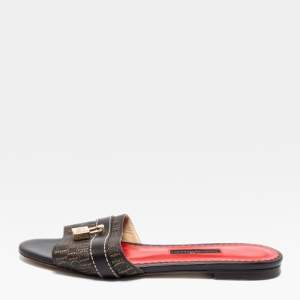 Pre Owned CH Carolina Herrera Dark Brown Monogram Embossed Leather Traveller Locked Flat Slides Size 38