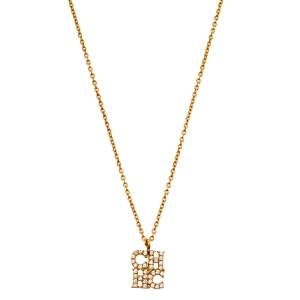 Pre Owned CH Carolina Herrera Crystal Logo Pendant Gold Tone Necklace