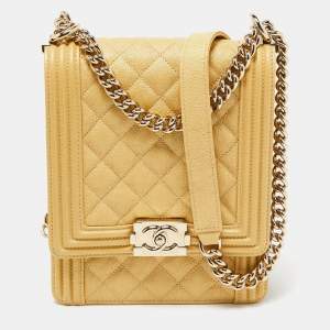 Pre Owned Chanel Gold Quilted Caviar Leather North South Boy Flap Bag