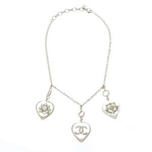 Pre Owned Chanel CC Aged Gold Tone Metal Motif Embedded Resin Heart Pendants Necklace 