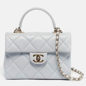 Pre Owned Chanel Blue Quilted Caviar Leather Mini Retro Twist Top Handle Bag