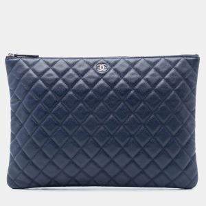 Pre Owned Chanel Blue Large Quilted Caviar O Case Clutch
