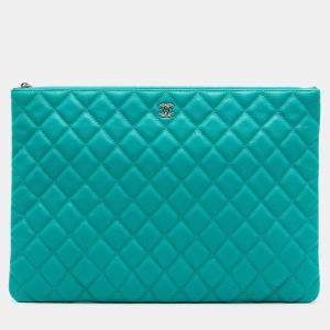 Pre Owned Chanel Blue Large Quilted Caviar O Case Clutch