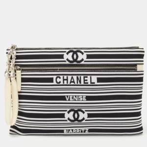 Pre Owned Chanel Black/White Stripe Fabric and Leather Zip Wristlet Clutch