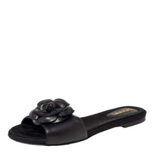 مملوكة مسبقًا Chanel Black Leather Camellia Embellished CC Slide Flats Size 38.5