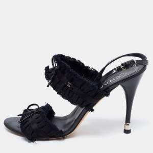 مملوكة مسبقًا Chanel Black Satin and Fabric Ruffle Trim Bow Ankle Strap Sandals Size 38.5