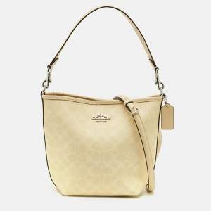 مملوكة مسبقًا Coach City Light Yellow Signature Coated Canvas Bucket Bag
