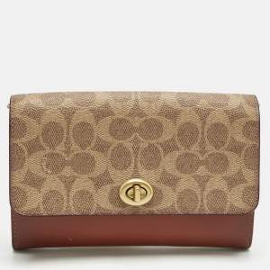 Pre Owned Coach Brown/Beige Signature Coated Canvas and Leather Marlow Clutch Bag