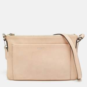 Pre Owned حقيبة كروس جلد خوخي بجيب أمامي كوتش