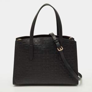 Pre Owned Coach Charlie Carryall Black Signature Embossed Leather Tote