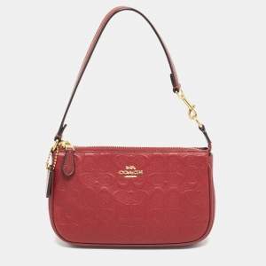 Pre Owned Coach Nolita Red Signature Embossed Leather Pochette