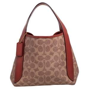 Pre Owned Coach Brown/Beige Signature Coated Canvas and Leather Hadley Hobo