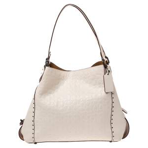 Pre Owned Coach Beige Signature Embossed Leather Edie 31 Shoulder Bag