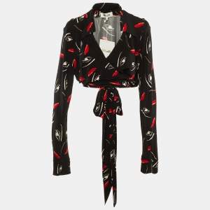 Pre Owned Diane Von Furstenberg Black Floating Face Print Jersey Wrap Around Bobbie Top XL 
