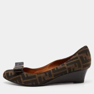 Pre Owned Fendi Tobacco Zucca Canvas and Leather Bow Round Toe Wedge Pumps Size 40.5