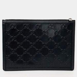 مملوكة مسبقًا Gucci Black Leather GG Embossed Clutch