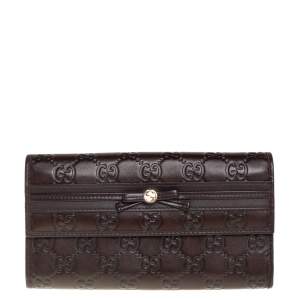 مملوكة مسبقًا محفظة غوتشي كونتينينتال مايفاير مزينة فيونكة جلد غوتشيسيما بني داكن