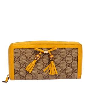 مملوكة مسبقًا محفظة غوتشي سحاب ملفت فيونكة شراشيب بامبو جلد بيج