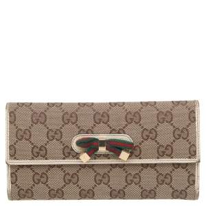 Gucci Beige-Cream GG Canvas And Leather Web Bow Continental Wallet