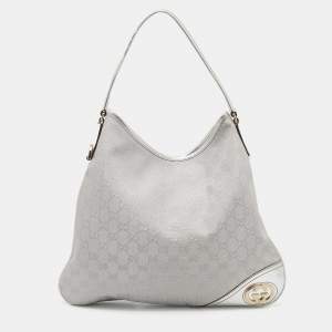Pre Owned Gucci Metallic Silver GG Canvas and Leather Medium Britt Hobo 