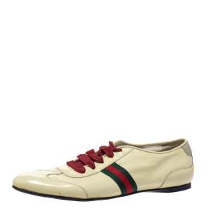 مملوكة مسبقًا حذاء رياضي غوتشي منخفض من أعلي و برباط علوي و مزين بشريط ويب جلد لامع أصفر مقاس 38.5