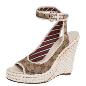 مملوكة مسبقًا Gucci Beige/White GG Canvas Ankle Strap Wedge Sandals Size 38.5