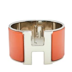 Pre Owned Hermes Clic Clac H Orange Enamel Palladium Plated Extra Wide Bracelet PM