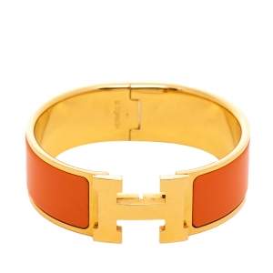 Pre Owned Hermès Clic Clac H Orange Enamel Gold Plated Wide Bracelet PM