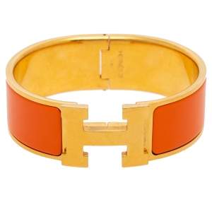 Pre Owned Hermès Clic Clac H Orange Enamel Gold Plated Wide Bracelet 
