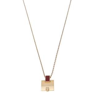 Pre Owned Hermes Eileen Red Enamel Gold Tone Metal Pendant
