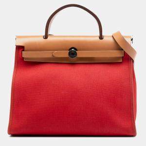 مملوكة مسبقًا Hermes Brown Red Toile Herbag Zip 31