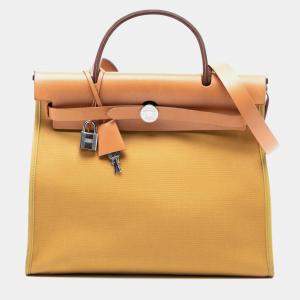 Pre Owned Hermes Brown Yellow Toile Herbag Zip 31
