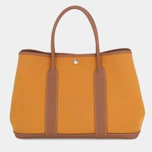 مملوكة مسبقًا Hermes Garden Party Saffron/Gold Toile Officier Negonda Leather Size Pm