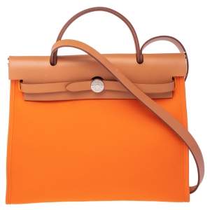 Pre Owned Hermes Orange/Natural Canvas and Leather Herbag Zip 31 Bag