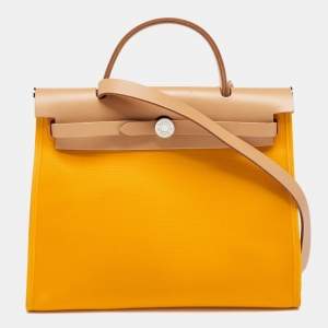 Pre Owned Hermes Jaune D'or/Natural Canvas and Leather Herbag Zip 31 Bag