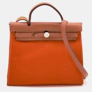 Pre Owned Hermes Orange/Natural Canvas And Leather Herbag Zip 31 Bag