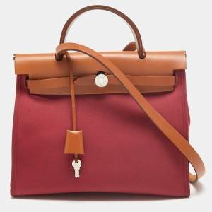 Pre Owned Hermes Ruby/Fauve Canvas and Leather Herbag Zip 31 Bag