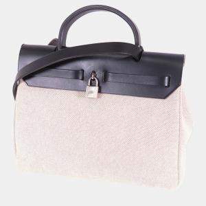 مملوكة مسبقًا Hermes Beige/Black Toile Herbag PM