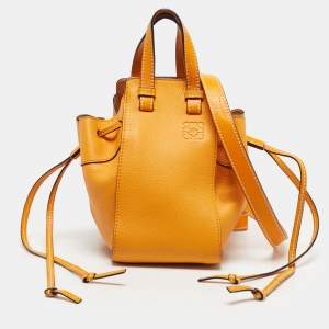Pre Owned Loewe Orange Leather Mini Hammock Drawstring Bag