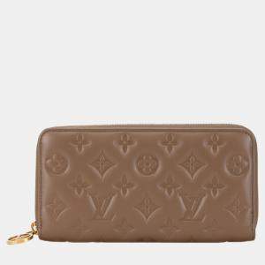 Louis Vuitton Beige Leather Monogram Zippy Wallet