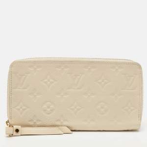 Louis Vuitton Creme Monogram Empreinte Leather Zippy Wallet