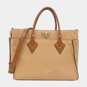 Pre Owned Louis Vuitton Leather Mahina On My Side MM Handbag