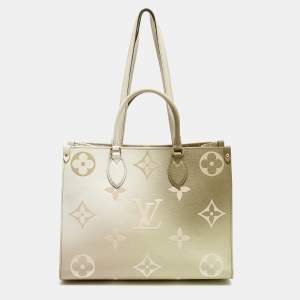 Pre Owned Louis Vuitton Sunset Khaki Monogram Giant Empreinte Leather Onthego MM Bag