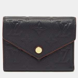 مملوكة مسبقًا محفظة لوي فيتون فيكتورين جلد أمبرين أسود مونوغرامي