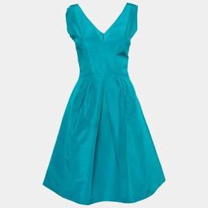 مملوكة مسبقًا فستان اوسكار دي لارينتا حرير أزرق مخضر بطيات بلا أكمام مقاس وسط ( ميديوم )