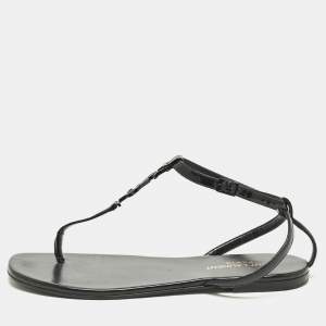 Pre Owned صندل سان لوران كاساندرا مسطح جلد أسود وجلد لامع مقاس 37