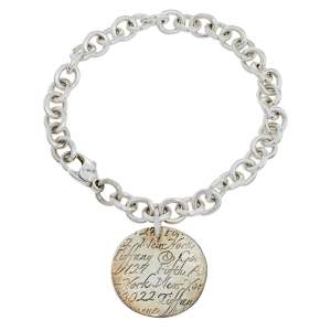 Pre Owned Tiffany & Co. Notes Round Tag Charm Sterling Silver Bracelet